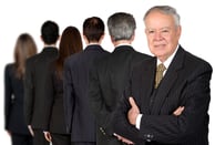 business people in a series with a senior boss standing facing the camera