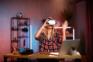 young-cheerful-woman-in-vr-goggles-working-in-augm-2022-06-20-23-13-55-utc (1)